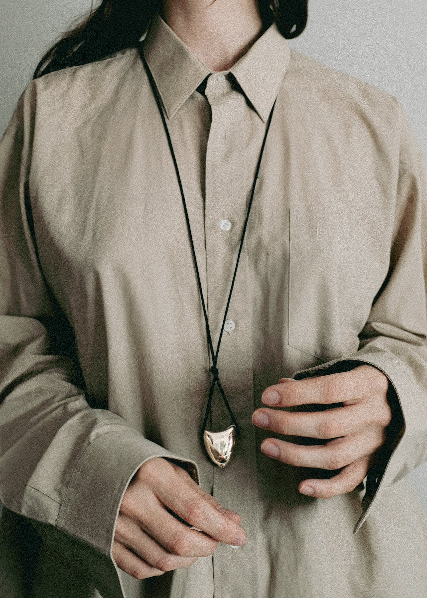 Medium Collaboration With Time Container Cord Pendant