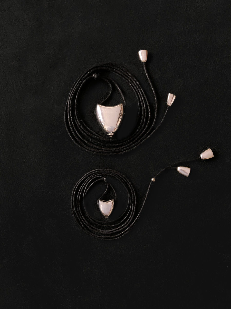 Medium Collaboration With Time Container Cord Pendant