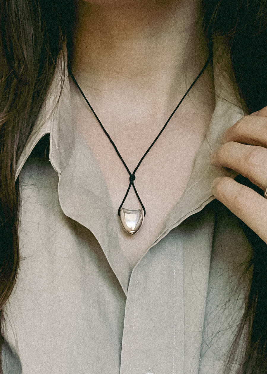 Small Collaboration With Time Container Cord Necklace